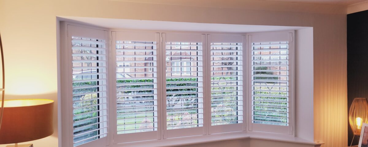 wide splay bay window shutters; installed in a home in the West Bridgford area of Nottingham.