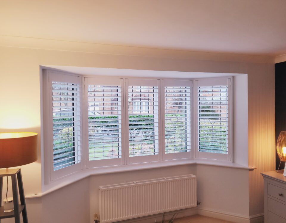 wide splay bay window shutters; installed in a home in the West Bridgford area of Nottingham.